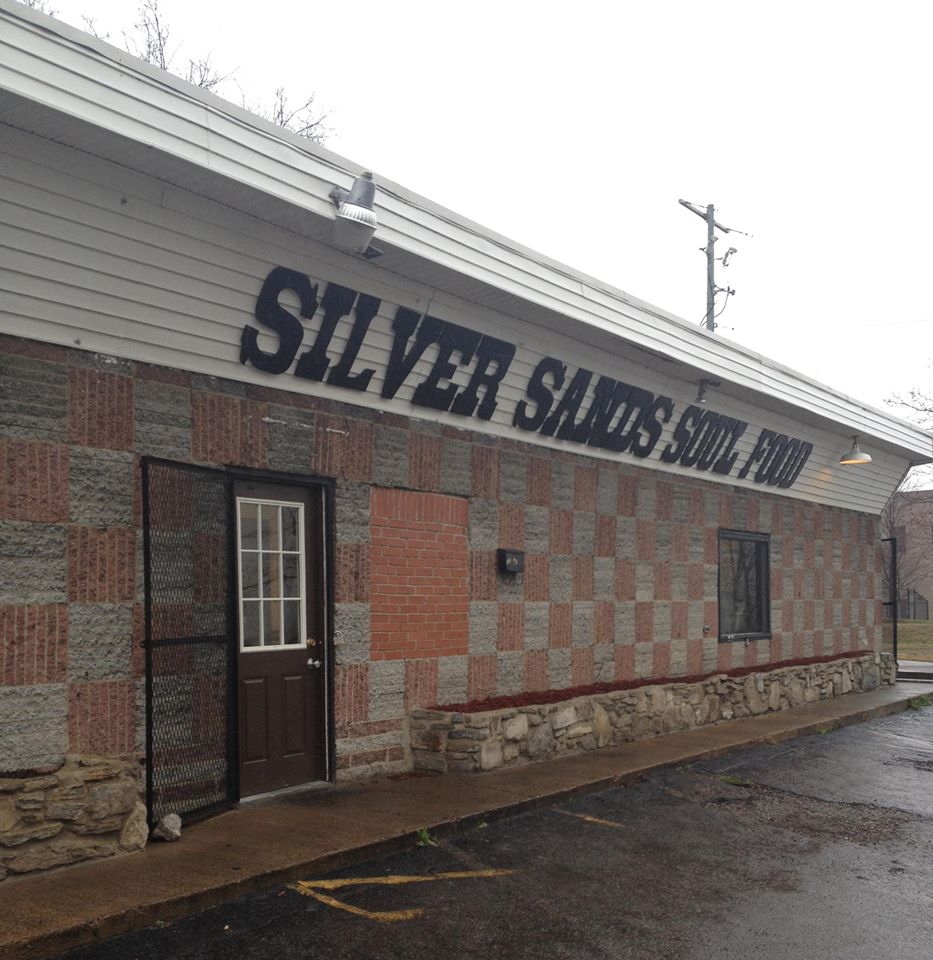 The Silver Sands Soul Food storefront on Locklayer Street, with its checkerboard brick and stone facade and hand-painted black sign